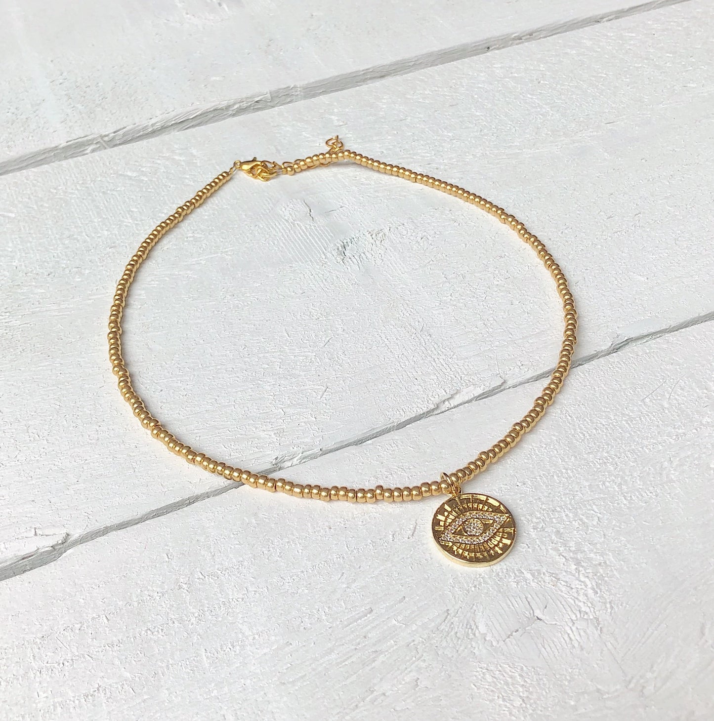 Gold Eye Coin Charm Necklace