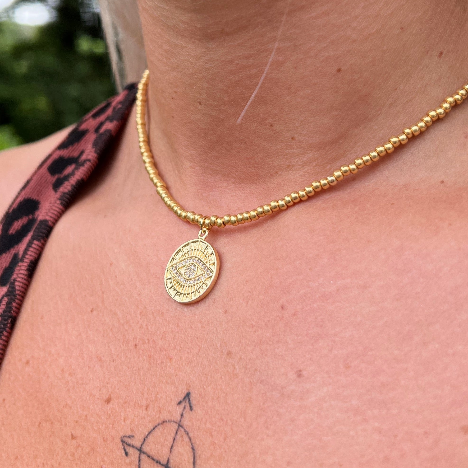Gold Eye Coin Charm Necklace